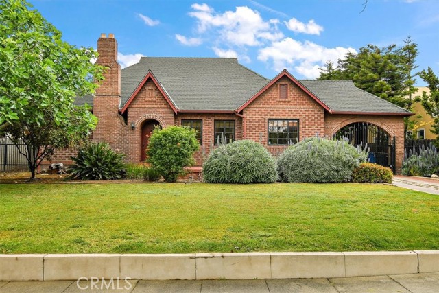 This Vintage English Tudor style one story home is located in the historic Lincoln Park area.  Certified as a historically designated structure with the Pomona Historical Commission, much of the original ammenities remain in good condition including wood flooring coved ceilings and iron paned windows.  Over the years some modern upgrades have been done such as central a/c and heat, granite kitchen countertops, and just this week a new oven and microwave were installed.  The large lot has alley access and fruit trees.