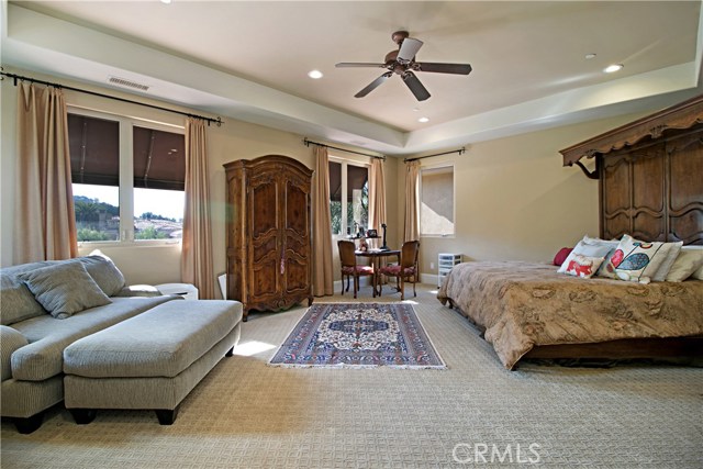 The master bedroom is grand with a large bathroom and two walk in closets.