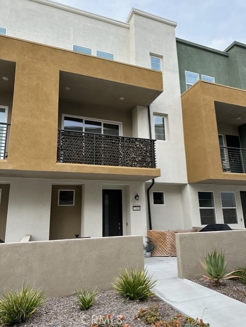 NEWER  THREE STORY TOWN HOME IN 5 POINTS VALENCIA MASTER-PLANNED COMMUNITY....Featuring and spacious and flexible floorplan with two primary suites.  Inside laundry on third floor.  The heart of the home is open and airy featuring a large great room that flows seamlessly into the chiefs dream kitchen with large walk in pantry.  Patio deck off of great room with expandable wide door for easy entertaining.  Large two car garage with extra deep storage area for toys 
The Community features a beautiful club house and pool and many gathering areas.