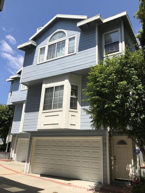 2350 Foothill Boulevard 13 La Canada Flintridge, California Spacious 3 Bedroom Townhouse in La Canada! Living Room with Hardwood Flooring, Fireplace, and Track Lighting. Dining Room with Breakfast Counter Upgraded Kitchen with Granite Counters, Limestone Flooring, Gas Range/Oven, Microwave, and Dishwasher. Master Bedroom with a Fireplace, Two Closets, Spa Tub, Separate Shower, Dual Sinks. Two Car Garage. Large Storage Room Next to Garage Can Be Used for Storage, Office, Gym, Game Room. Washer and Dryer located in Storage Alcove. New Paint Throughout. Excellent Location Close to Markets, Restaurants, and Retail Shops. Home is situated within Award Winning Glendale Unified Schools and attends Crescenta Valley High.