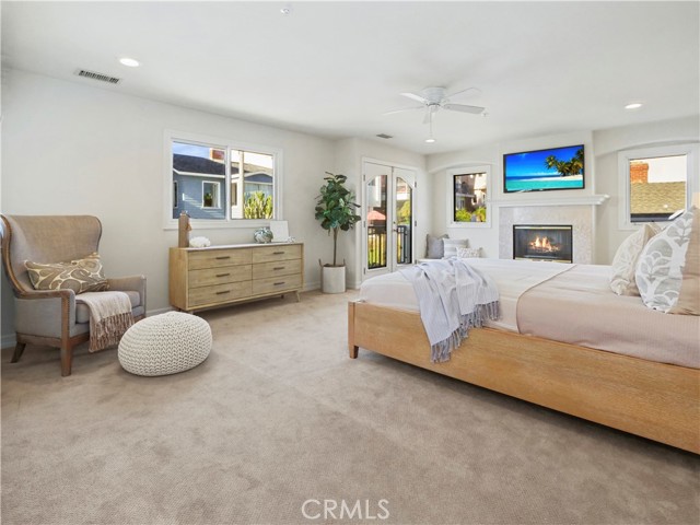 master bedroom with fireplace & 2 walk in closets