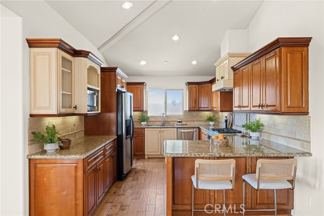 Open kitchen. Balcony #2 door is on the other side of the refrigerator.