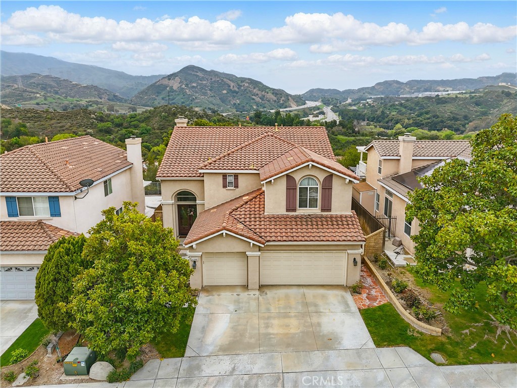 Discover your dream home in the coveted Lantana Hills community—a stunning Five-bedroom, Three-bath boasting the largest and most inviting floor plan. Immerse yourself in the seamless flow of the open-concept design, offering breathtaking hillside views from the kitchen, dining area, and living room. Unwind in the expansive upstairs loft or enjoy panoramic vistas from the master suite and its elegant bath. Conveniently, a spacious bedroom with a full bath is located downstairs for guests or multi-generational living. Additional features include a dedicated laundry room and a generous 3-car attached garage, offering ample storage and functionality for modern living. The Lantana Hills community enriches your lifestyle with lush greenery and a refreshing pool, providing the perfect backdrop for relaxation and leisure. Make this your forever home today!