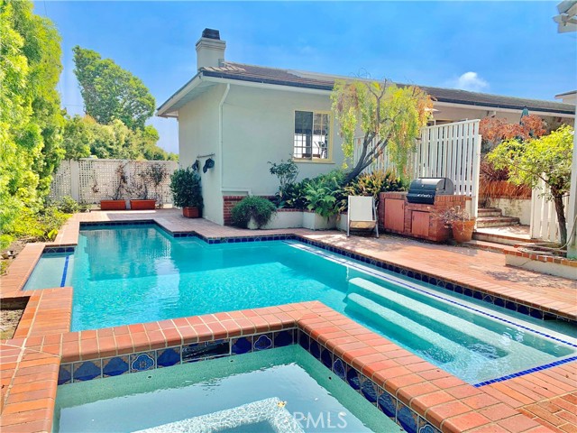 1043 Franklin Street Santa Monica, California Charming traditional CITY and OCEAN VIEWS 4 bedroom, 4 baths home on quiet Franklin St. sited on a generous 10,559 square foot lot! Three bedrooms, including the MASTER suite are on the MAIN LEVEL. There is one bedroom downstairs at basement level, and a very private second story office with a beautiful PANORAMIC VIEW upstairs. Great opportunity to Remodel, renovate or develop new. The master suite faces a large, private, and tranquil courtyard that leads you to a sparkling pool/spa. Updated kitchen open to great room filled with NATURAL LIGHT and CITY VIEWS. Fenced in and elevated front yard surrounded by mature landscaping. Stellar location near golf course and all amenities in Santa Monica and Brentwood. An incredible opportunity not to be missed!