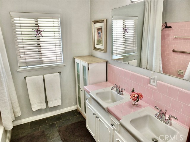 Hallway bath with pristine 1955 pink tile