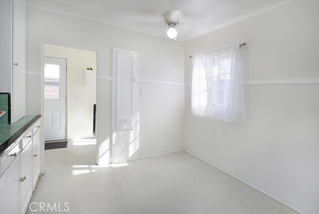 Imagine what you could do with this kitchen space. Maybe, a built in banquet with seating, storage and a table or floor to ceiling cabinetry or a kitchen island.