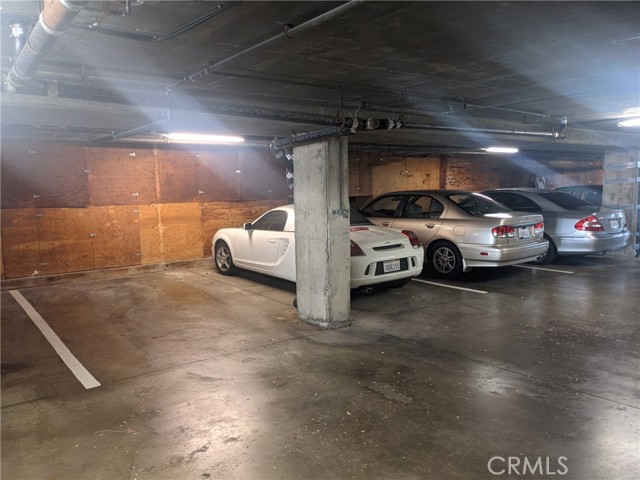 side by side (2) parking spots with lots of garage storage