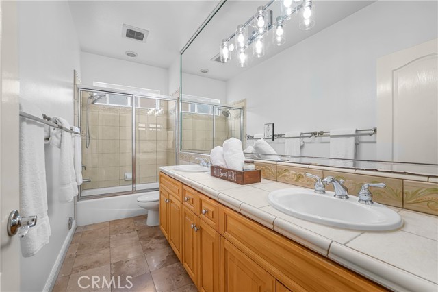 downstairs bathroom with double vanity