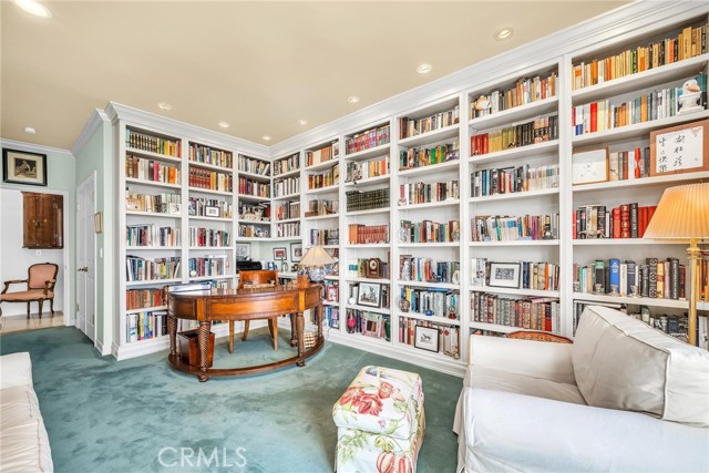 Den includes built-in bookshelves