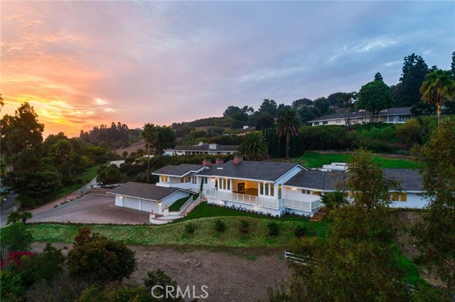 2864 Palos Verdes Drive N Rolling Hills, California NEW CONSTRUCTION! With 5 bedrooms, 2 offices, and 8 bathrooms, this custom-built, ranch style home boasts high-end finishes throughout. Primary suite occupies the east wing off the entry while an additional 3 ensuites sit on the opposite end of the first floor. An expansive great room with vaulted, 20ft ceilings overlooks panoramic views of Los Angeles. Downstairs includes a full wet bar, classic style movie theater, 1000+ bottle wine cellar, private ensuite and elevator. Living is made simple with fully-integrated, Crestron home automation system that includes security cameras, alarm system, pool and spa controls, entertainment controls and more. Situated on 1.22 acres, exterior features include outdoor kitchen, herb garden, pool and spa, firepit, BBQ, Pizza Oven, and citrus orchard. All information is deemed reliable but not guaranteed, BTV.