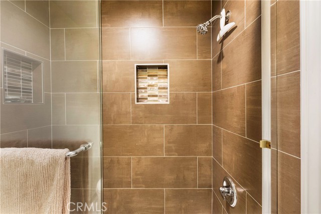 Master bedroom shower with updated tile