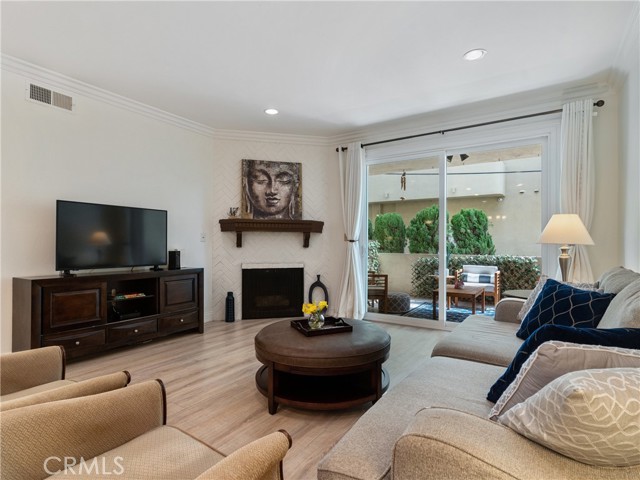 Fireplace in living room adds great ambiance.