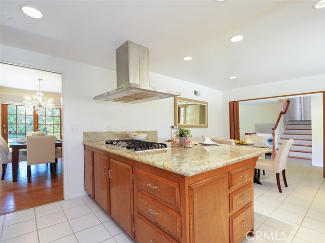 Kitchen Opens to Formal & Casual Dining Area