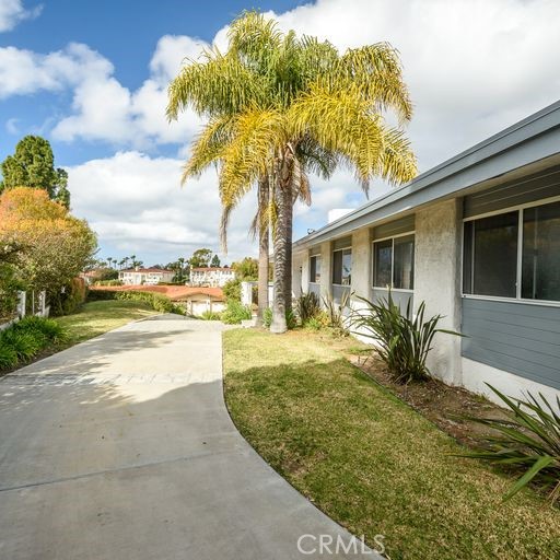 view from top looking towards the street . 3 car garage to the right