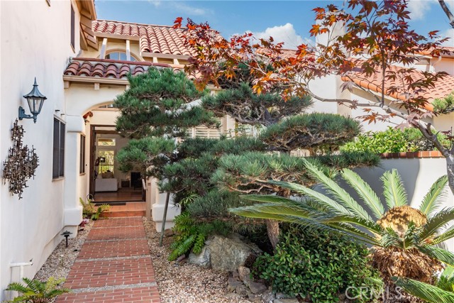 Pretty, verdant Entry Courtyard