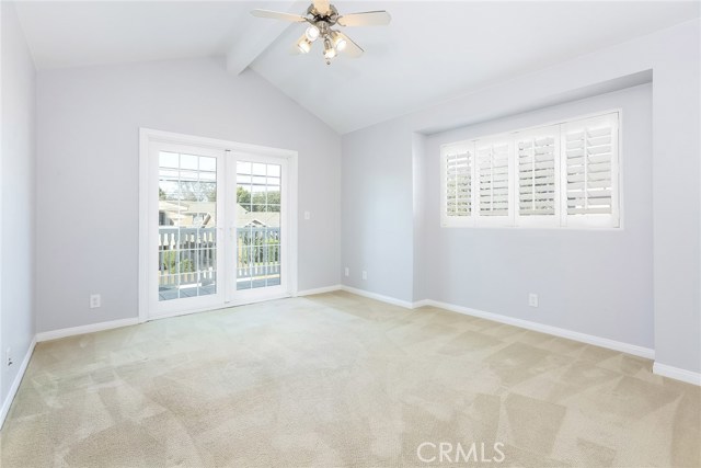 North East room w/deck access, vaulted ceiling w/fan