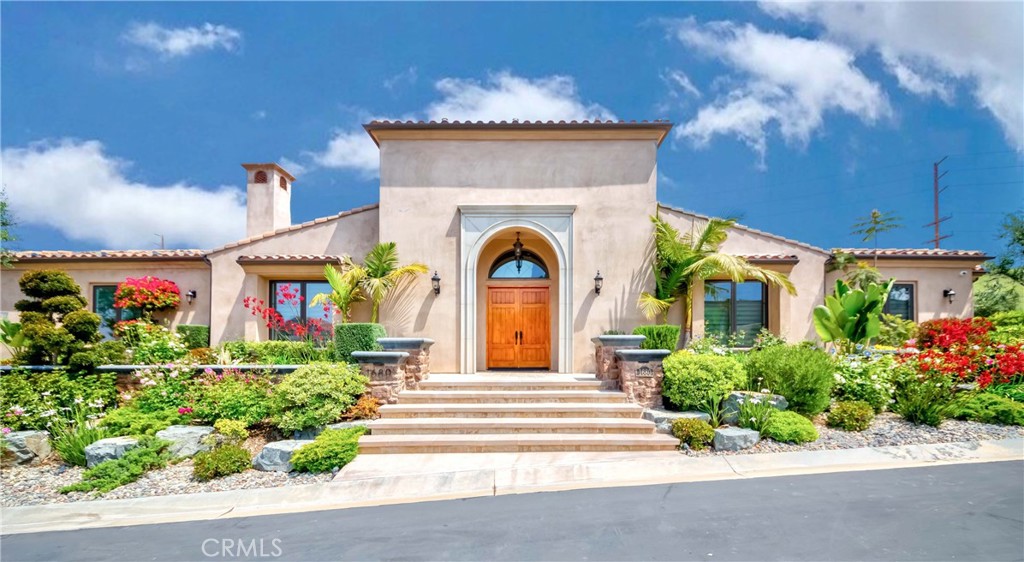 Luxury and gorgeous **Hidden Gem** single story home in a private gated community in Brea.  This high-end newer home features double entry doors, 4 spacious bedrooms with 4.5 bathrooms, single story with 4,610 S.F., in lot of 24,580 S.F., and built in 2018. Modern color of wood flooring throughout, living room with high ceiling, fireplace with gorgeous lightings.  Master suites with double sink, his and her closet, a separate shower and bathtub. Formal dining room for family entertaining. Spacious and gourmet kitchen with huge center island, custom countertops, upgraded appliances, family dining area, and mountain view. This essence of a party home is located cul-de-sac and features a professionally landscaped backyard, large patio with barbecue facilities, a luxurious fire pit, and a beautiful mountain view of Brea Hills. Attached three car garage and driveway for extra parking.