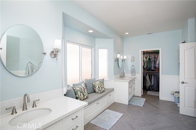 Master bathroom with two sinks.