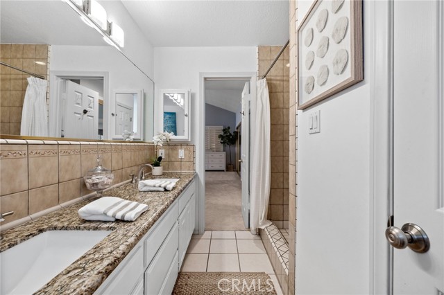  
Owner's Suite private bath with dual sinks