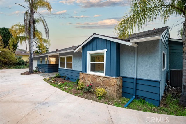 Nice driveway and 2 car garage at the end.