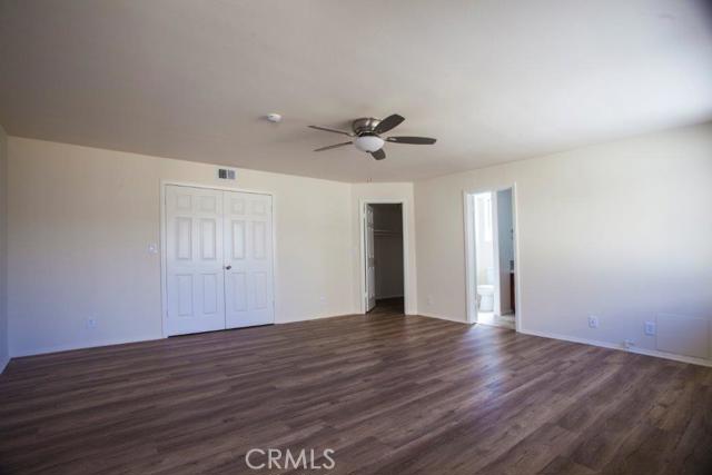 Master bedroom with walk in closet and master bath