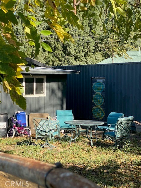 Looking from the back  corner towards the back of the property. Note: That container with the door belongs to the current tenant.