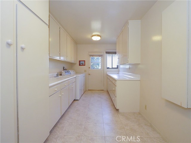 Huge Laundry room on main level with access to 3 car garage