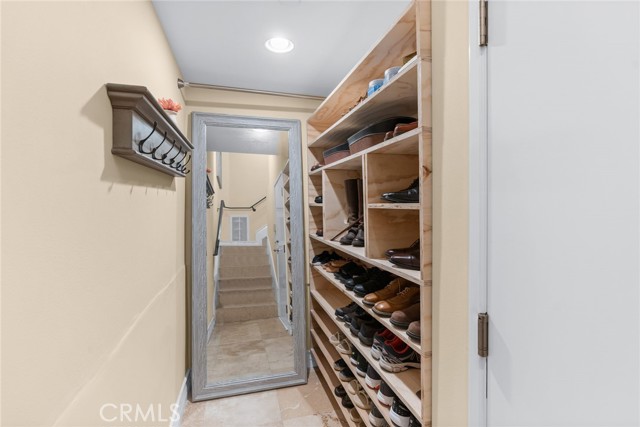 Exit to garage from this convenient hall/mudroom area.