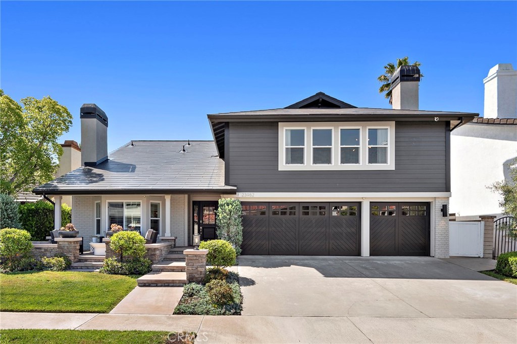 Welcome to 23982 Cormorant Ln, a luxury home blending modern sophistication with sustainable living in one of Laguna Niguel’s most desirable neighborhoods. This 4-bedroom, 3-bathroom residence spans 3,283 square feet and boasts high-end finishes throughout, creating the perfect environment for relaxation and entertaining. Upon entering, you're greeted by elegant wood floors and a chef-inspired kitchen featuring Dolomite countertops, Walker Zanger tile, and stainless steel appliances. The open-concept design seamlessly connects the kitchen, living, and dining areas, ideal for everyday living and hosting guests. Step outside into the backyard, an entertainer’s paradise, with a black pebble-bottom pool and hot tub. The pool features a Baja table bench and is equipped with Pentair pool equipment, including a variable-speed pump and mobile control. An outdoor kitchen with a Twin Eagle BBQ grill, fridge, TV, two zones of speakers, and an outdoor fireplace completes the space perfect for relaxation and entertaining. The primary suite serves as a luxurious retreat, featuring a spa-like bathroom with Carrera marble countertops and double sinks. A sliding door opens to an oversized deck, offering private access to the backyard pool and hot tub, creating an ideal place to unwind. A standout feature is the bonus room, designed with QuietRock drywall to minimize sound transfer. This versatile space also includes a sink and beverage fridge, making it perfect as a media room or home office. The home is powered by an energy-efficient Tesla solar roof, with a lifetime warranty, reducing utility costs and supporting a sustainable lifestyle. It also boasts cutting-edge technology, including a Control4 smart home system that integrates Sonance speakers, subwoofers, audio, video, lighting, climate control, and security creating the perfect environment with the touch of a button. A Bryant air conditioning and heating system, along with a whole-house fan, ensures comfort in every season. The home has been repiped with PEX plumbing, ensuring modern, efficient systems. The 3-car garage features solid wood doors that open via the MyQ app, offering remote access. With built-in storage and epoxy floors, the garage is functional and stylish. The home is also equipped with video surveillance, integrated into the Control4 system for enhanced security. Situated on a 6,840-square-foot lot, 23982 Cormorant combines luxury, convenience, and sustainability, it's an ideal place to call home.