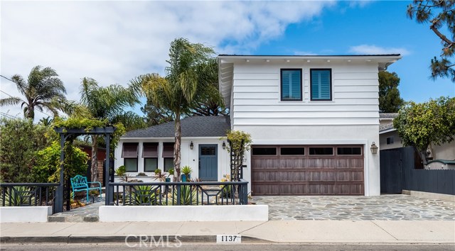 1137 9th Street Manhattan Beach, California MODERN LIVING in this elegant turnkey Coastal Plantation Home. Move right in to this impeccable 2015 remodeled home that has been taken down to the studs & reimagined by local Architect Joyce Flood. Roof, plumbing, electrical, fixtures, windows, floors, drywall, cabinets, tile & stone are like new. Over 3 dozen improvements since the remodel to keep this home modern and effortless. Landscaping on the 7500 SF lot was professionally planned by Greg Sims Landscaping and SEED Group. Lot has been approved for an Accessory Dwelling Unit by city of MB. The great room, with fireplace, and kitchen with island that opens to the rear yard, can only be described as an entertainer's delight. One of the largest Stone Pine trees in Manhattan Beach is the centerpiece of the low upkeep backyard, featuring 300 sq.ft. of raised composite decking, 800 SF of natural stone pavers, hundreds of feet of green turf, a Bocce ball court, fruit trees, separate BBQ area with refrigerator, granite counters & benches, gas fire pit, and even an outdoor raised dining tent pavilion with chandelier. The front yard is just as inviting with a raised stone patio at the front entrance, flagstone walkways, granite benches, bubbling fountain, and lush drought tolerant landscape. Take a peek at all the upgrades included on attached Supplement.
