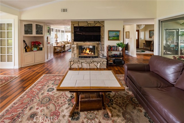 Family Rm, Living Room at back left, Foyer on back right