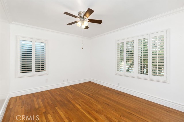 Beautiful hardwood floors in the original footprint bedrooms and living room. Smooth ceilings and plantation shutters!