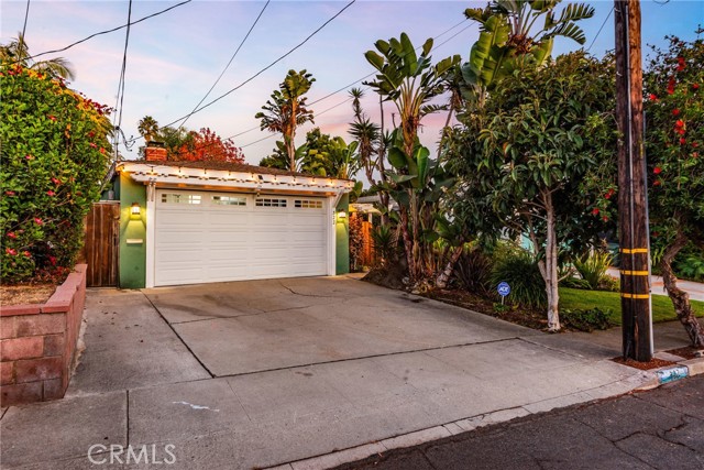 Welcome home to your private oasis with mature landscaping and more