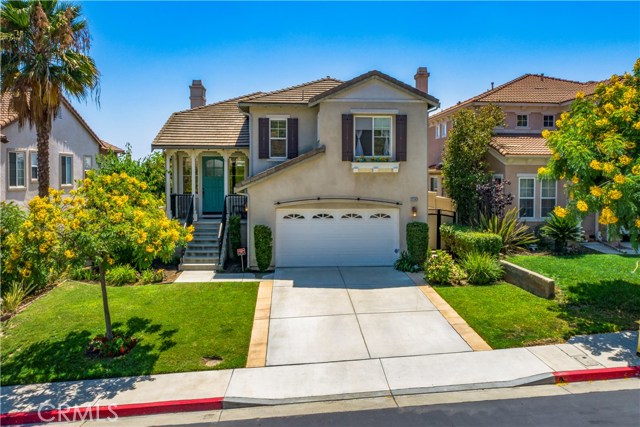 2263 Junipero Avenue Signal Hill, California Gorgeous ocean, Catalina, Downtown Long Beach and Palos Verdes views from this remarkably functional and clean split-level home. Watch the sunsets shower the home in the evening, the twinkling city lights at night, and panoramic fireworks displays on the 4th of July! Perched on top of the Westbluff Estates community, this home features the living, dining and kitchen area on the top floor giving you beautiful views from the most often used living spaces. The upstairs master bedroom features an organized walk-in closet and a large open executive bath. The master bedroom also features serene views of the hillside with no neighbors across the street. A trail head directly in front of the home gives you close access and a brief walk to the community pool, spa, and BBQ area. Easy to use features like the automatic blinds, smart controlled porch and ceiling lights, and electric car charging in the finished garage provide extra security and comfort. Amazing opportunity to own a detached home with remarkable Southwesterly views!
