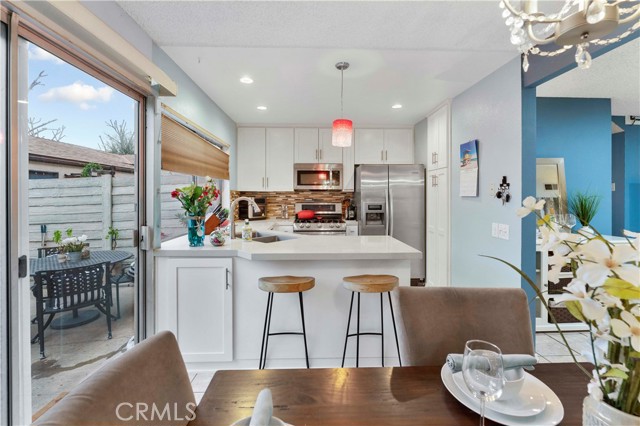 Looking at your newly updated (within the last three years) kitchen with shaker cabinets and appliances to remain.