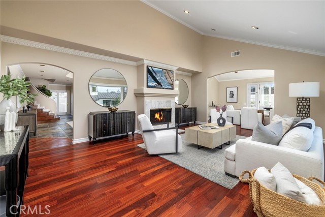 Dual-sided fireplace between Living Room and Great Room.