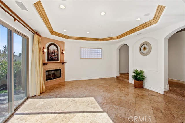 Living room with a sliding glass door to the patio/back yard.