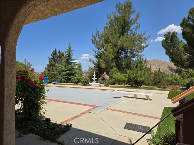 pool with electric cover. View facing southwest