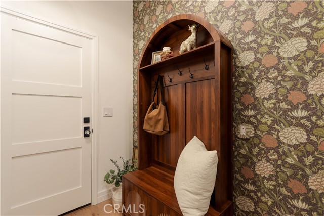 Custom drop station in the pantry is designed specifically for busy, everyday living with dedicated space for backpacks, bags, mail, and daily Essentials.