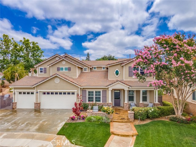 This outstanding, customized home is located on an 11,000+ sqft lot in the heart of one of Yorba Linda’s premier neighborhoods, not only does it represent superior craftsmanship & detail but epitomizes the entertainer’s lifestyle. Bright, open, and welcoming our home features 10ft+ ceilings, beautiful wood grain tile flows through the entire downstairs, and plenty of windows provide an abundance of natural light that pours into the home. The family and kitchen open up to each other creating this massive great room feel, perfect to entertain like a pro. The center island takes center stage in the kitchen, and you have plenty of cabinetry and counter space to do with as you’d like. 3 bedrooms upstairs and 2 downstairs give you the flexibility for those large families to enjoy their own space or create an office and work from home. Outside you have resort-style grounds that come with a relaxing pool, spa, multiple palm trees, stamped diamond cut concrete, built-in gas BBQ with seating for 6-8 guests, multiple sitting and conversation areas, a built-in fireplace, multiple fruit trees (peach, plum, avocado, lemon, & apple), RV parking, and turf grass area.  With its premier location, incredible schools, and steps to the best parks, hiking trails, and entertainment, this home is ready for you to fall in love.