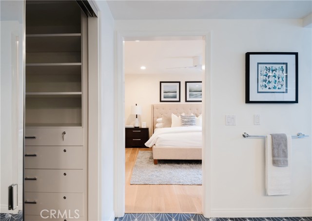 Primary large organized closet with custom drawers