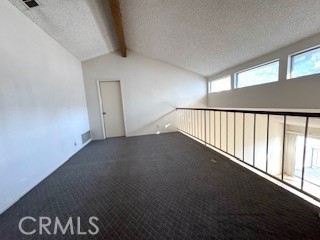 Natural lights shine in the upstairs loft.