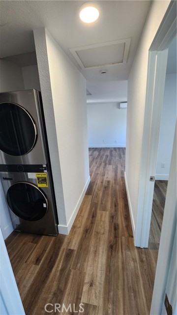 Hallway from MBR shows BR2 on right and bathroom on left