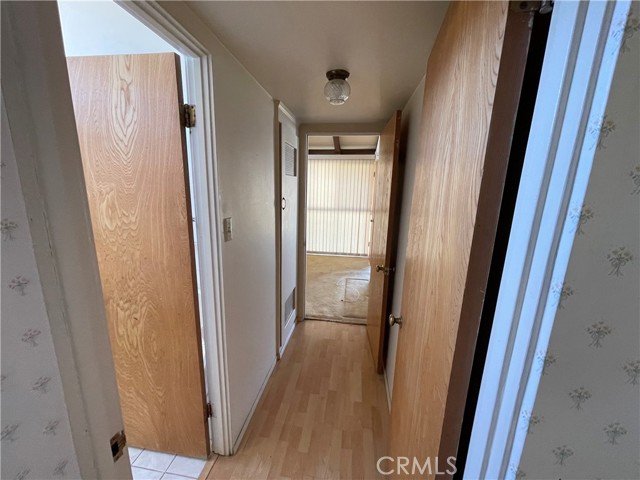 Hallway off Kitchen to separate bath/bedroom