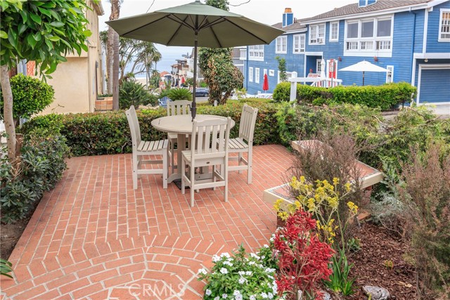 216 6th Street Manhattan Beach, California Fabulous location and fantastic home!! New Air Conditioning. Wonderful remodeled Manhattan Beach walk street home. This property is on a quiet walk street, just steps to the beach / strand and a short distance to downtown Manhattan Beach with a variety of restaurants/ coffee shops and boutique shops. The home has a large living room, master suite, guest bedroom and gourmet kitchen. Dining area seats 4-8 guests with a breakfast bar. Includes private laundry with washer and dryer, A/C and large 2 car garage with remotes and storage. Master suite encompasses 1/3 of the first floor and the guest room on the lower level is private with bath, with fireplace and includes a private patio. Fireplace in living area as well. The outdoor walk street patio is ideal for a BBQ and relaxing while watching the beautiful sunsets and ocean views.