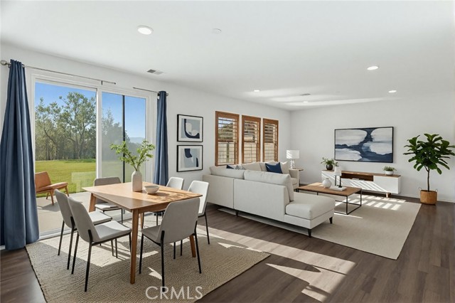 Dining/Living room. This photo is virtually staged.