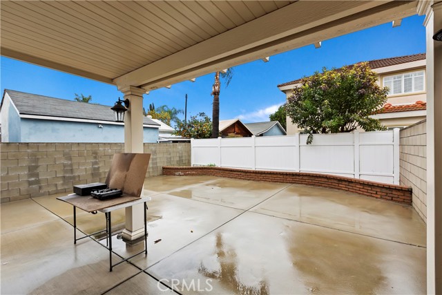 Backyard view from sliding doors, under the covered patio.