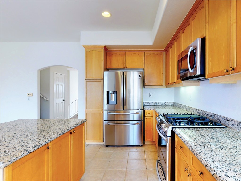 Open Kitchen with Stainless appliances