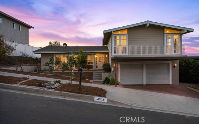 Nothing short of stunning curb appeal with a picturesque sky light backdrop that enhances the aesthetic charm.