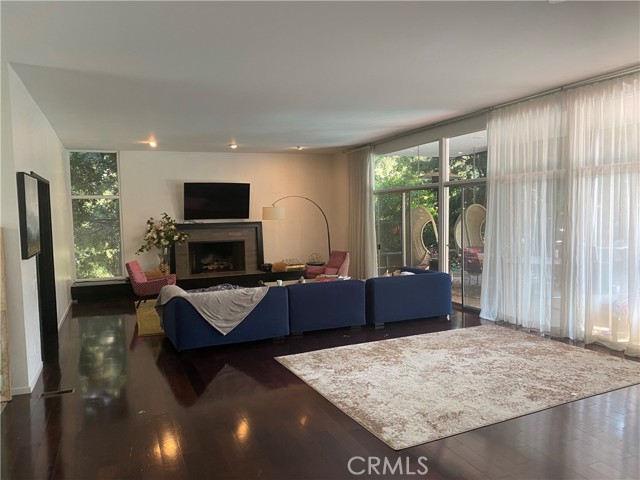 Gated & Private Home on Approx. 1.5 acres, resting on a Beautiful Cul-de-sac street off Upper Benedict Canyon.  10 Mins from the Beverly Hills Hotel with a Great Canyon setting .  It has an Open Floor plan enticing Indoor-Outdoor Living & Entertaining.  The spacious Living-Dining room w/ Fireplace opens to a Covered Patio, Swimming Pool & Landscaping.  The kitchen has a large storage & Breakfast area.  Huge Master suite looks onto the pool and has a Walk-in closet and a large Bath with double vanity sinks.  2 more Bedrooms each open to patio, BONUS: Entirely private 1 Bdr / 1 Bath Guest unit above the Garage. A Home with Unimaginable potential for Privacy & Entertainment.